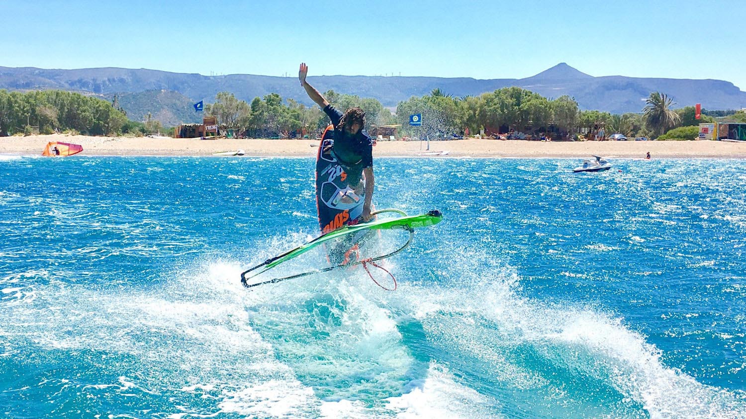 Surfing at Kouremenos Beach